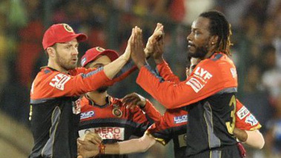 RCB to bat first; Gayle dropped, De Villiers in