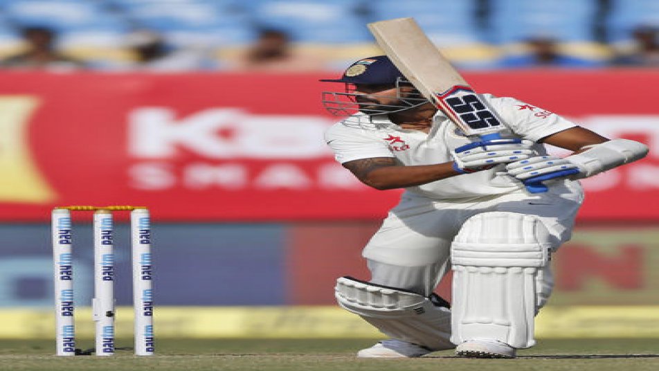Vijay completed his 8th Test ton and his 3rd against England in the 4th Test at Wankhede.(AP PHOTO)