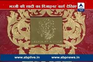 Harbhajan WEDS Geeta. Have a look at their designer wedding card