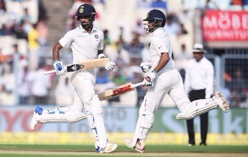 Dhawan, Rahul frustrate Sri Lanka with fighting fifties