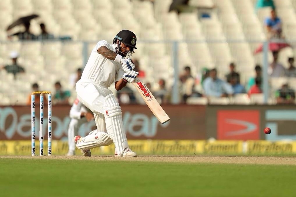 Dhawan, Pujara guide India to 192/4 at tea