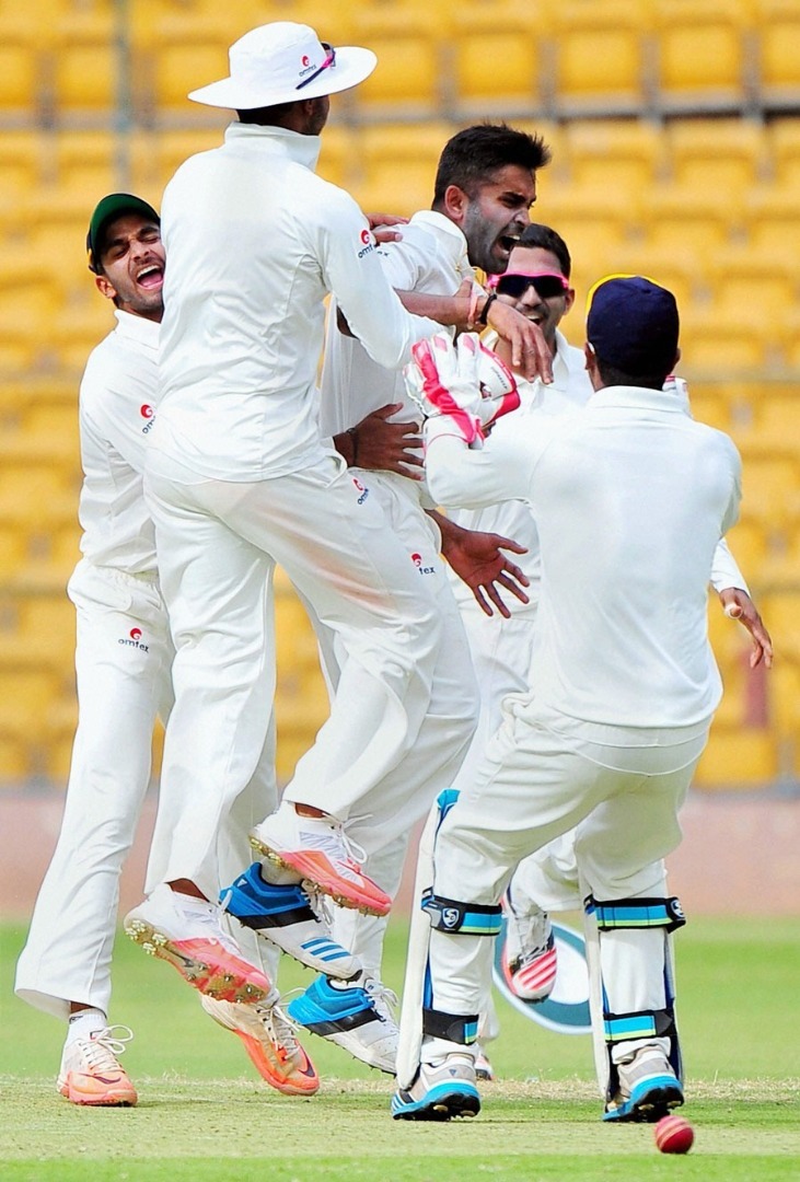 karnataka rout mumbai by an innings to storm into semis Karnataka rout Mumbai by an innings to storm into semis