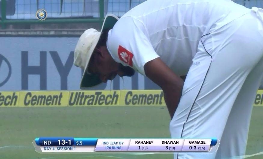 lakmal returns back to dressing room after vomiting on the kotla ground Lakmal returns to dressing room after vomiting on ground