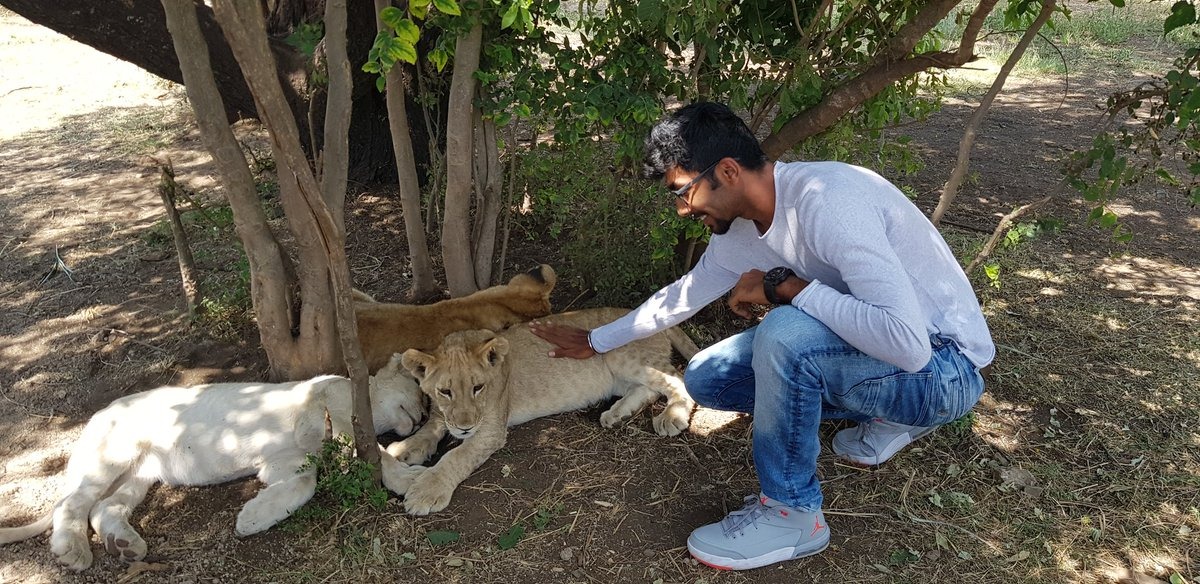 Pacer Jasprit Bumrah in Mabula Resorts clicking photo with cubs.