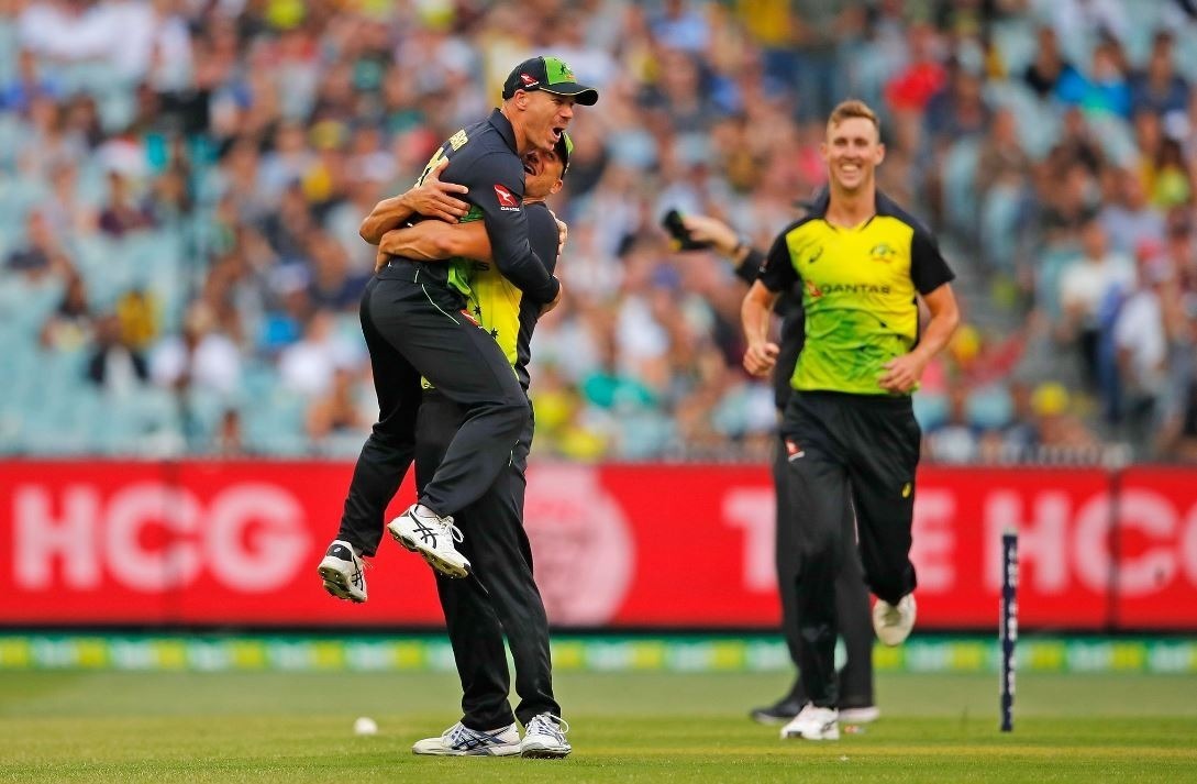 Unbeaten Australia cruise to tri-series final