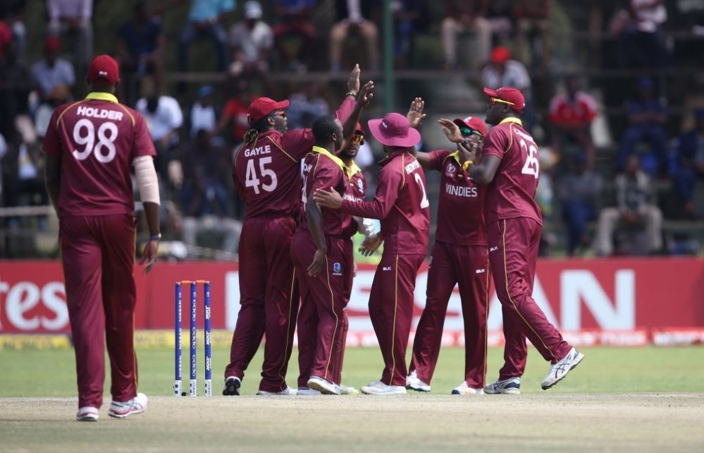 rain takes to west indies to world cup knocks scotland out Rain takes West Indies to World Cup, knocks Scotland out