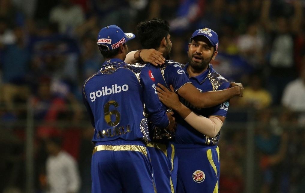 mi stun kkr by 13 runs keep playoff hopes alive MI stun KKR by 13 runs, keep playoff hopes alive