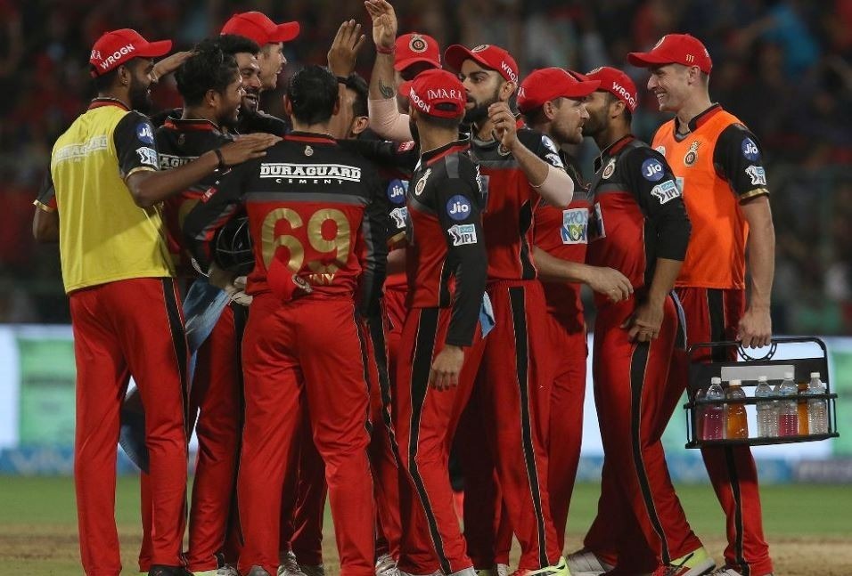 RCB keep playoff hopes alive with 14-run win, MI all but out of IPL