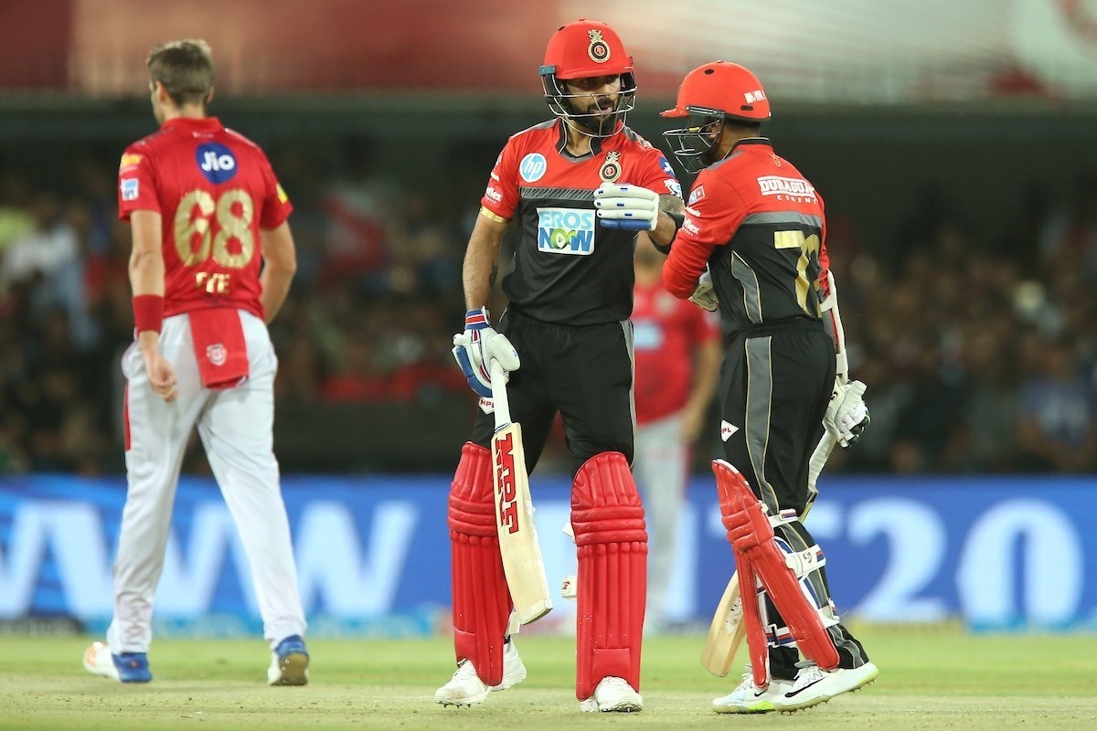 rcb thrash kxip by 10 wickets to keep ipl campaign alive RCB thrash KXIP by 10 wickets to keep IPL campaign alive