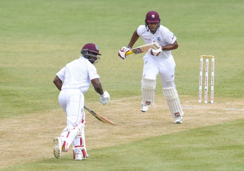 Smith battles for Windies on soggy, slow going day