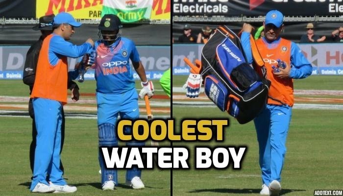 dhoni turns water boy and his pictures go viral on social media Dhoni turns water boy and his pictures go viral on social media