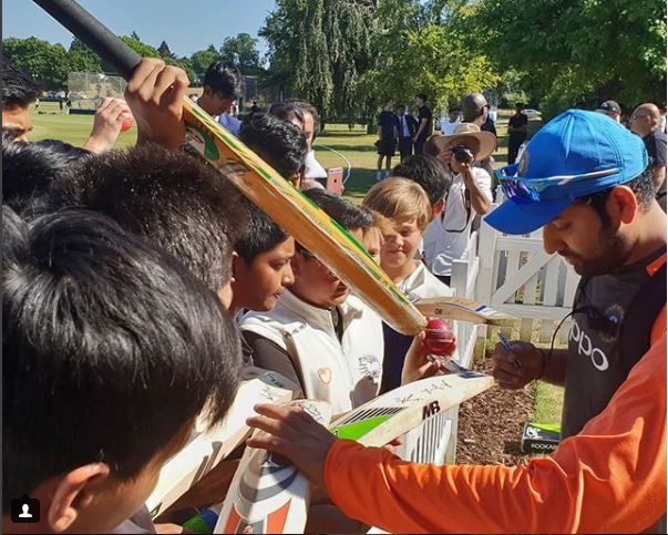 Rohit Sharma attends the practice session and his young fans surround him for autographs/ Courtesy: Instagram