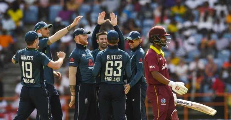 buttler overpowers gayle england pip west indies in six hitting fest Buttler overpowers Gayle, England pip West Indies in six-hitting fest