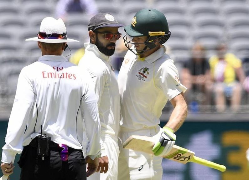 watch tim paine vs virat kohli is getting so heated the umpires have stepped in WATCH: आज एक बार फिर भिड़े कप्तान विराट और टिम पेन, अंत में हुई विराट की जीत