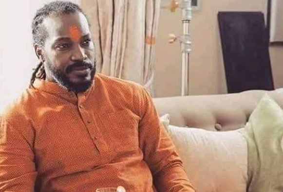 is chris gayle in his saffron garb and tilak campaigning for bjp in lok sabha polls लोकसभा चुनाव में क्या बीजेपी के लिए प्रचार करेंगे क्रिस गेल ?